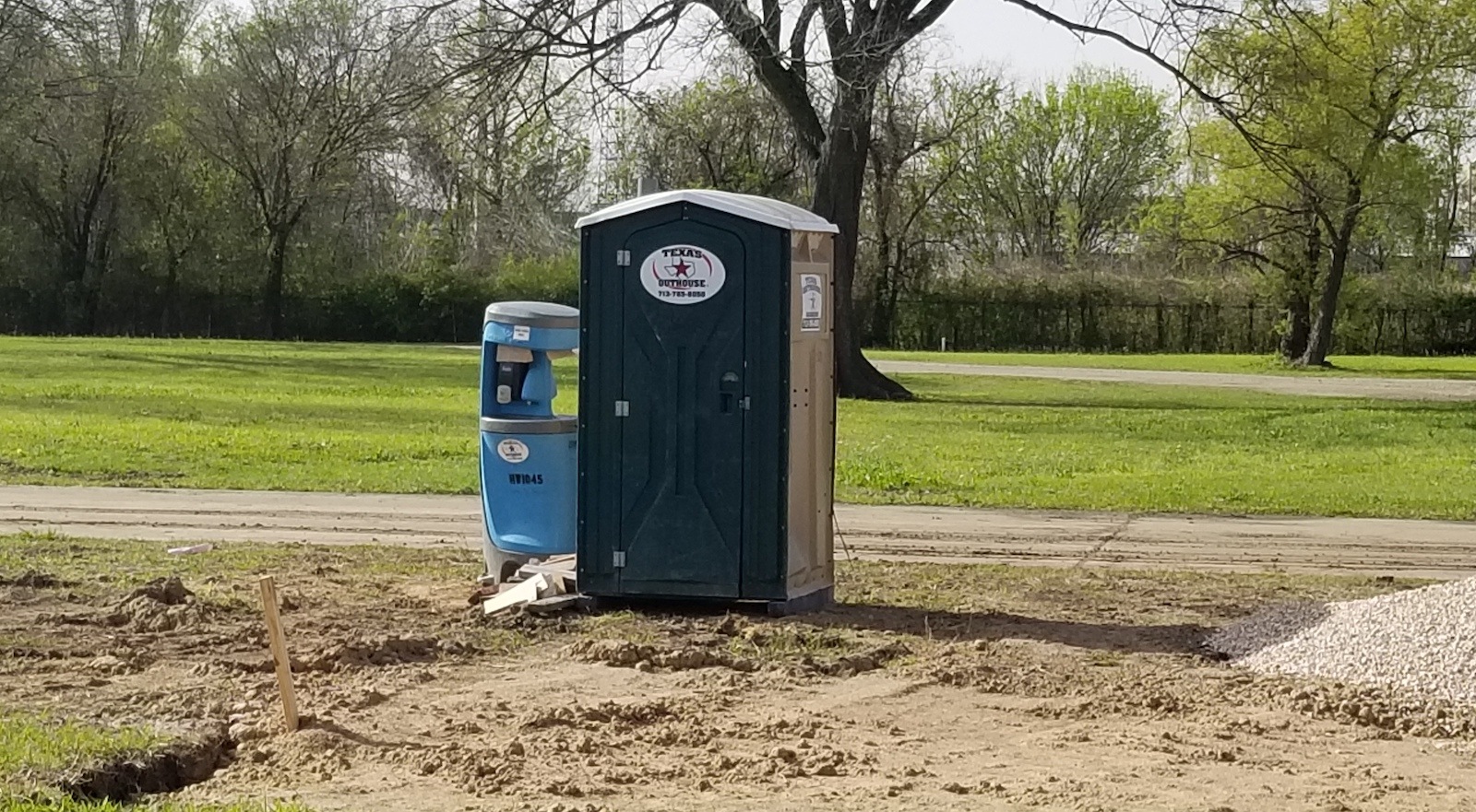 Handwashing Station and Portable Toilet from Texas Outhouse at a job site